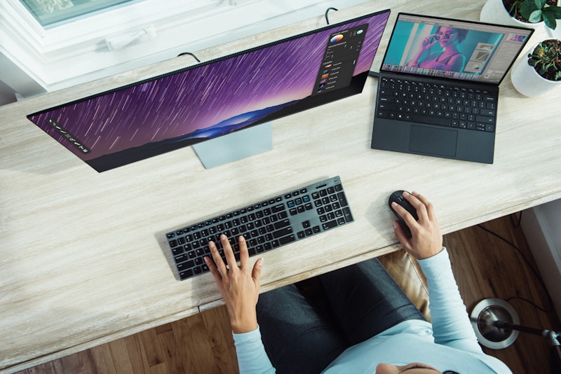 Laptop computer displaying Spotify desktop application with playlist sharing menu visible