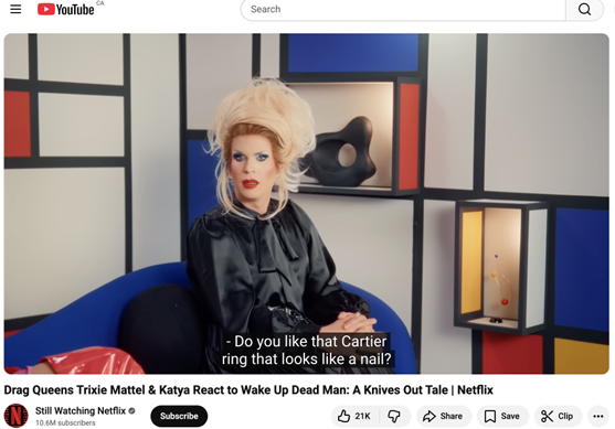 A YouTube video from Netflix featuring drag queens Trixie and Katya where they're reviewing the Netflix movie, Wake Up Dead Man: A Knives Out Tale. promote your YouTube channel